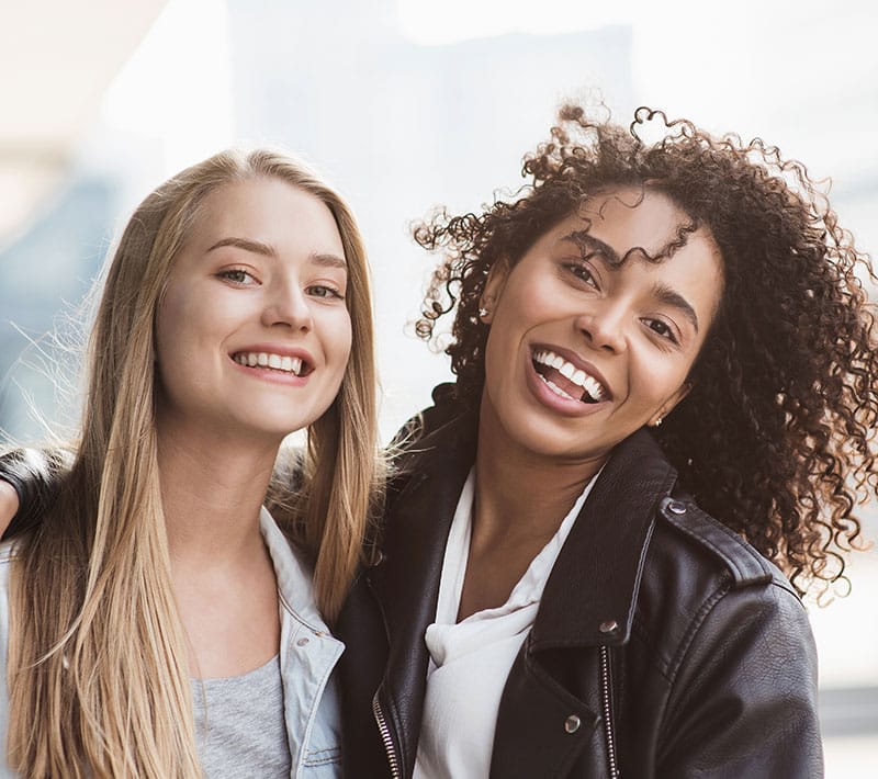 two women with beautiful skin